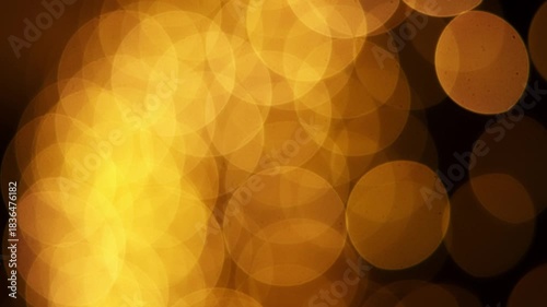 Golden Bokeh Lights on Dark Background