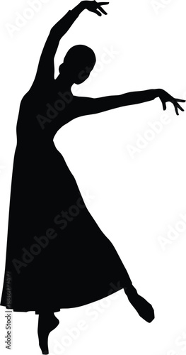 Silhouette of a female dancer performing an elegant ballet or modern dance pose