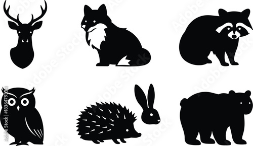 Set of woodland animal silhouettes including deer, fox, raccoon, owl, hedgehog, rabbit, and bear, detailed black vector icons for wildlife design and nature illustrations