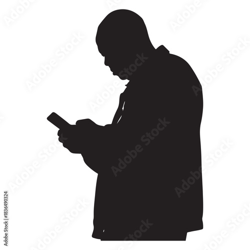 Silhouette of a man looking down at his mobile phone with his hands male person