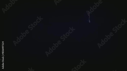 A faint streak of light in the dark void