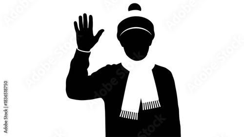 Dynamic young man wearing beanie and casual clothes making a strong hand gesture against a dark background