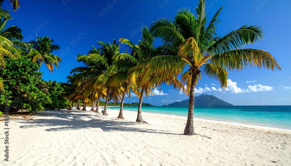 Obraz premium Tropical beach with golden sand, turquoise waves, leaning palm trees, and bright blue sky.