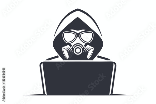 Hooded figure wearing gas mask works intently at a computer in monochrome