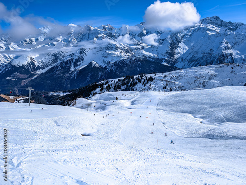 Mountains and skiing in Les Contamines, French alps.