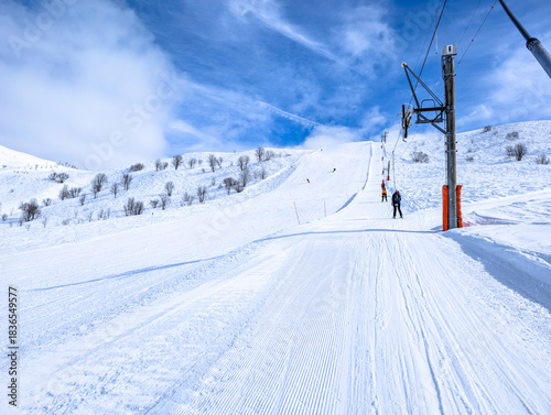 Mountains and skiing in Les Contamines, French alps.