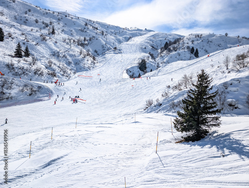 Mountains and skiing in Les Contamines, French alps.