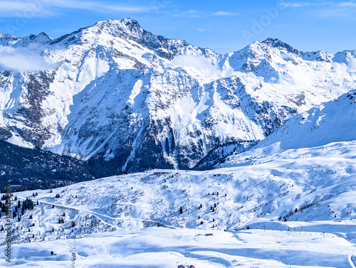 Mountains and skiing in Les Contamines, French alps.