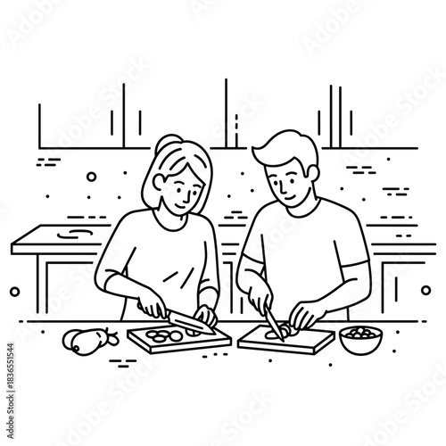 Young caucasian female and male cooking together in a modern kitchen