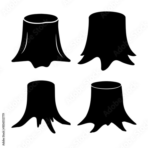 Set of four tree stump black silhouettes isolated on white