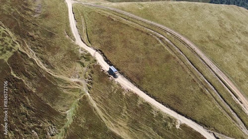 Truck Driving on Remote Mountain Road
