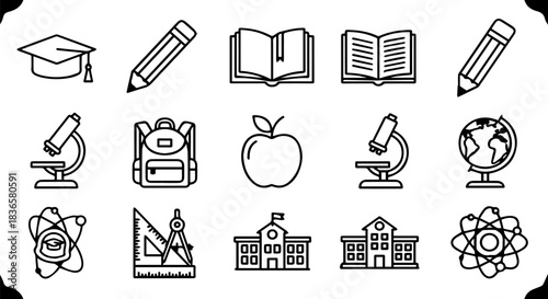 Close up of a black and white cat face with striking green eyes looking up