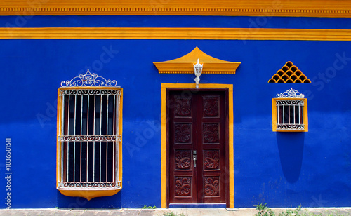 Xalapa, or Jalapa, Veracruz State, Mexico. Typical colourful facade in blue and yellow.