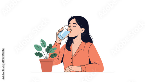 Calm professional woman refreshing herself with a cool glass of water next to a vibrant desk plant