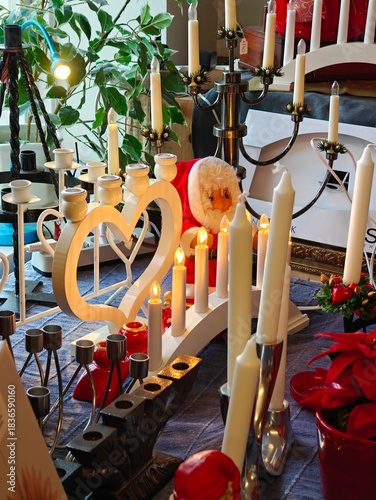 Christmas and New Year decorations in a thrift store, candles, stars, festive ornaments, second-hand holiday decor