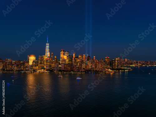 Aerial view of Manhattan at sunset with 911 memorial lights