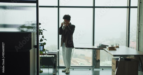 Wallpaper Mural Office staff scrutinizing figures amidst tense discussions Torontodigital.ca