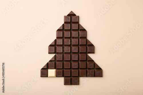 A creative Christmas tree made from dark and white chocolate bars.