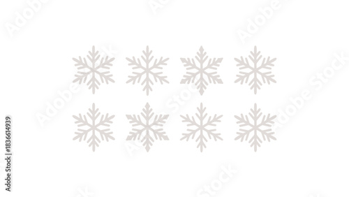 Collection of eight delicate white snowflake icons with intricate crystalline patterns arranged in two rows on a clean white background