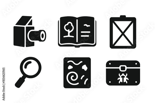 Camera is shown next to a book