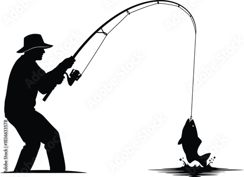 Silhouette of a fisherman wearing a hat actively reeling in a large fish that is jumping out of water