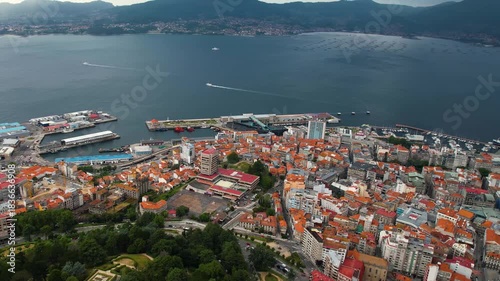 Aerial panorama view around the downtown in the harbor city Vigo in Spain on a cloudy summer afternoon.