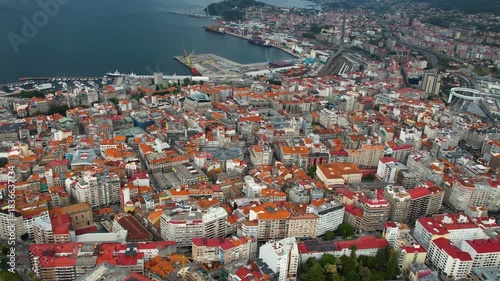 Aerial panorama view around the downtown in the harbor city Vigo in Spain on a cloudy summer afternoon.