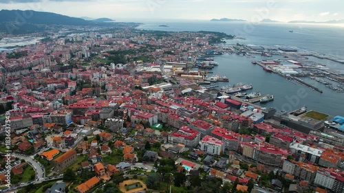 Aerial panorama view around the downtown in the harbor city Vigo in Spain on a cloudy summer afternoon.
