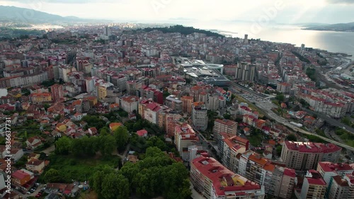 Aerial panorama view around the downtown in the harbor city Vigo in Spain on a cloudy summer afternoon.