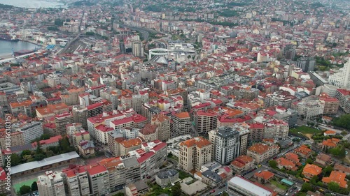 Aerial panorama view around the downtown in the harbor city Vigo in Spain on a cloudy summer afternoon.