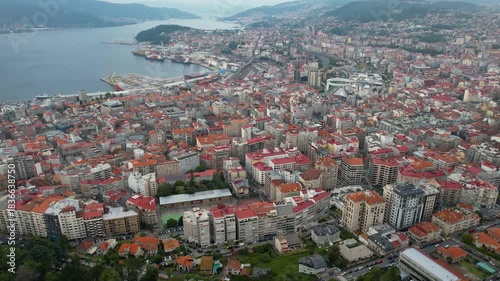 Aerial panorama view around the downtown in the harbor city Vigo in Spain on a cloudy summer afternoon.