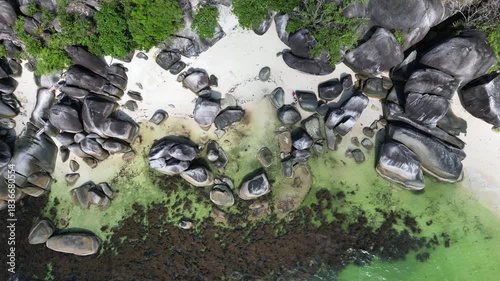 Belitung beach drone view, Tanjung Tinggi beach, a beautiful tropical beach with big rocks in Belitung, Indonesia. Also known as Laskar Pelangi beach