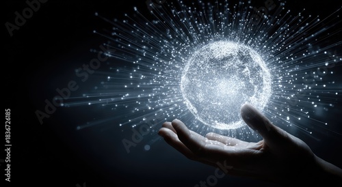 Glowing orb of light radiating from a cupped hand against a dark background