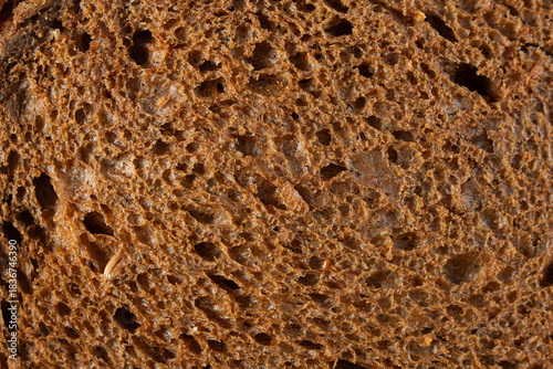 Foto A top down view of pumpernickel bread, as a background.