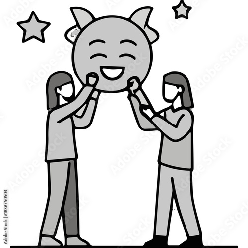 Two People Holding Up a Large Smiling Emoji Face with Horns Against a Dark Starry Sky