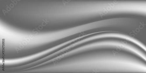 Silver foil background with a metallic mirror texture. Chrome gradient surface with a slight sheen. Gray aluminum sheet with reflections. Abstract cool background of platinum and titanium.