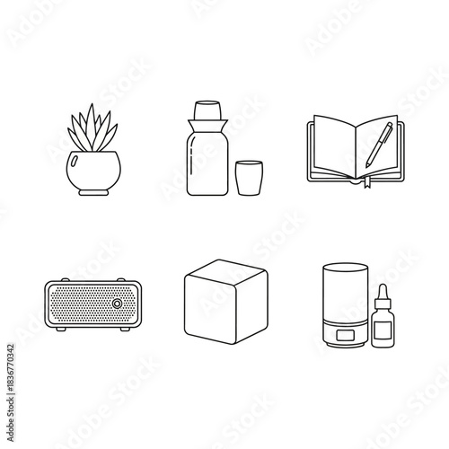 wellness essentials a curated self-care collection with diffuser oils succulent speaker cube and journal for relaxation and mindfulness