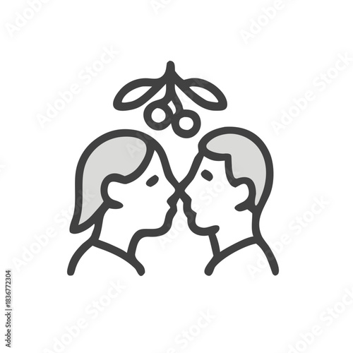 Romantic holiday moment captured  two in love under traditional holiday mistletoe. Suitable for christmas cards, lovethemed designs, romantic concepts.