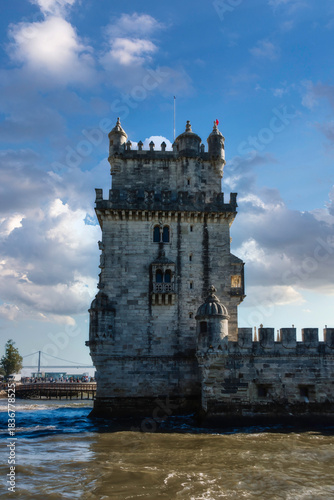 Belém Tower, a 16th-century fortification located in Lisbon that served as a point of embarkation and disembarkation for Portuguese explorers. Side view