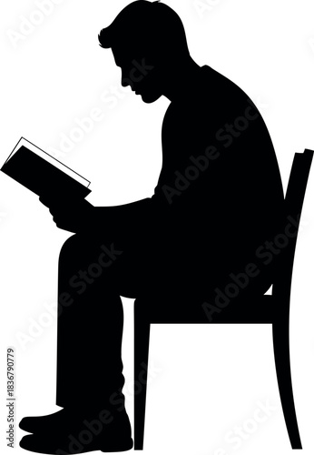 Silhouette of a man sitting on a chair reading a book, illustrating concentration and learning