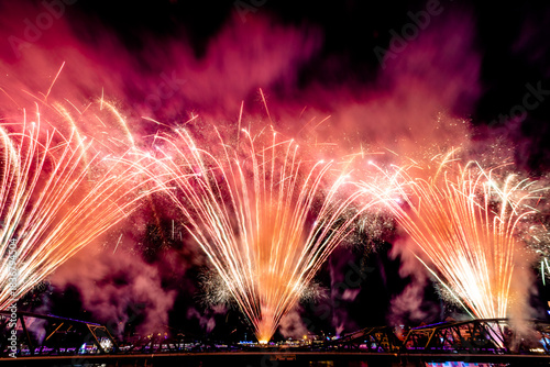 The blurred background of fireworks (light trails) is beautiful at night, seen in the New Year holidays, Christmas events, for tourists to take pictures during public travel.