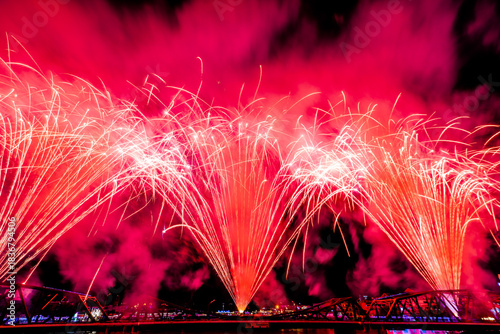 The blurred background of fireworks (light trails) is beautiful at night, seen in the New Year holidays, Christmas events, for tourists to take pictures during public travel.