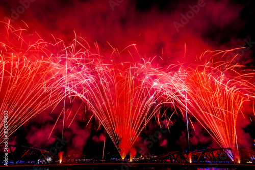 The blurred background of fireworks (light trails) is beautiful at night, seen in the New Year holidays, Christmas events, for tourists to take pictures during public travel.