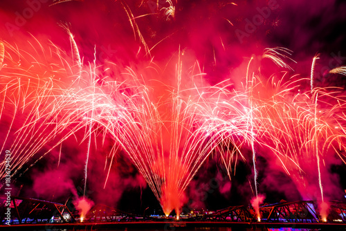 The blurred background of fireworks (light trails) is beautiful at night, seen in the New Year holidays, Christmas events, for tourists to take pictures during public travel.