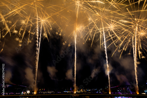 The blurred background of fireworks (light trails) is beautiful at night, seen in the New Year holidays, Christmas events, for tourists to take pictures during public travel.