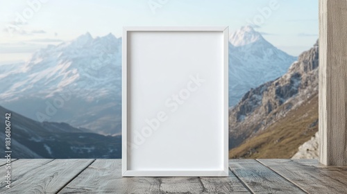Empty Frame Against Scenic Mountain Landscape with Wooden Surface and Clear Blue Sky in Background