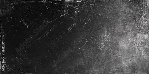 Dark grunge black texture with scratches, dust and splatters for both print and digital use.