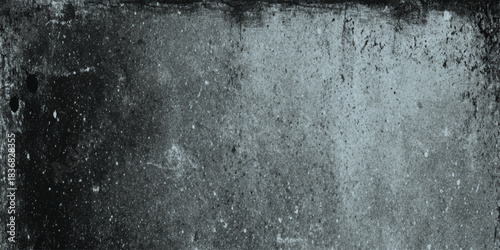 A high resolution monochrome photograph featuring a dark distressed center, creating a dramatic.