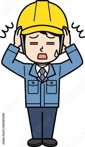 頭を抱えるヘルメットをかぶった現場監督の男性