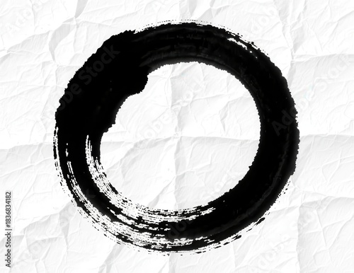 Black Circular Brush Stroke on Crumpled White Background